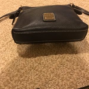 Dooney and Bourke black leather Crossbody bag.